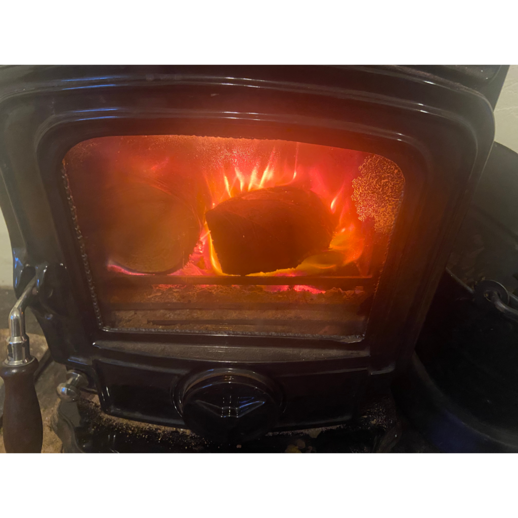 Cosy winter fire - inviting us to slow down as a natural way to manage stress